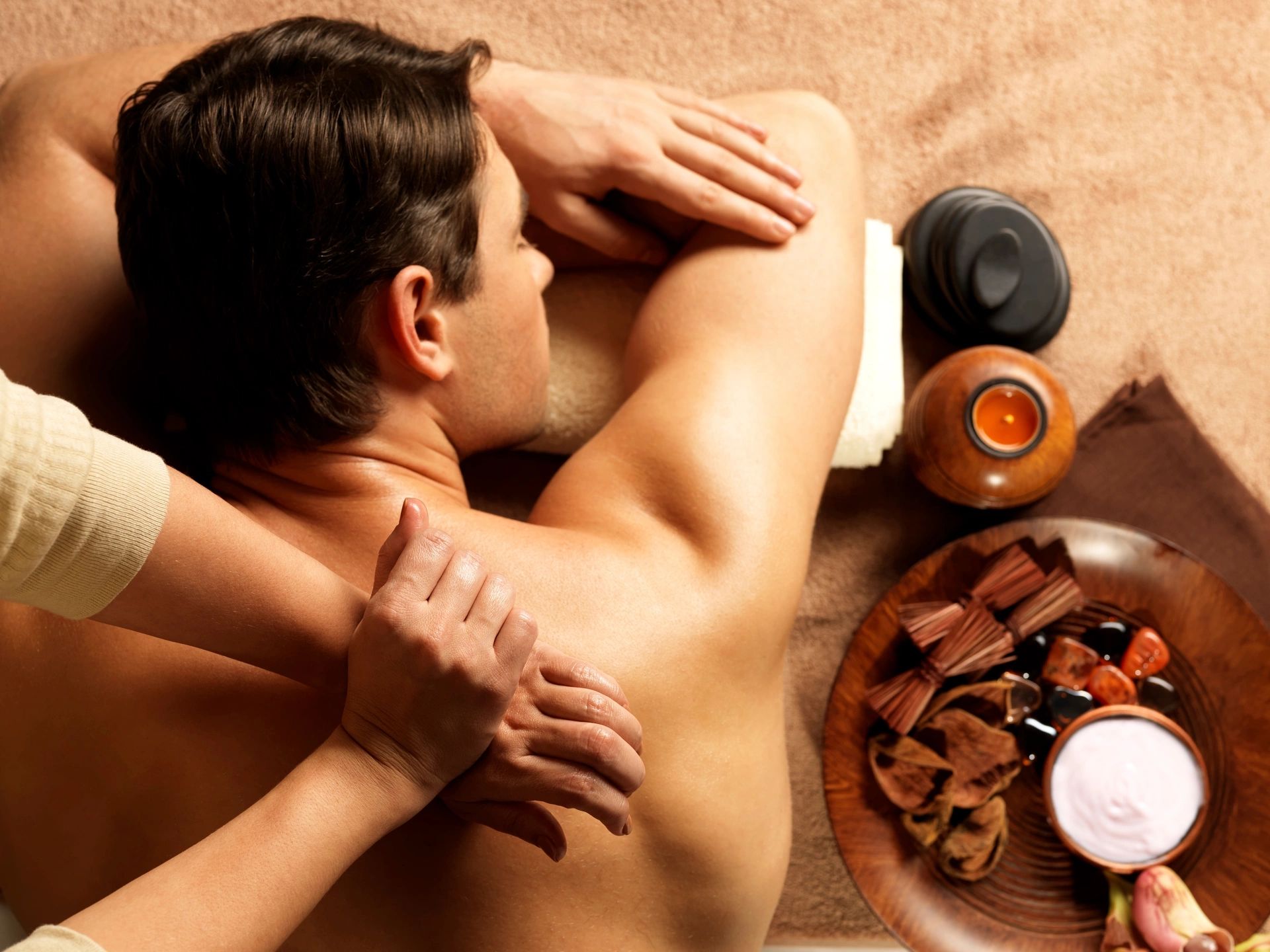 men enjoy deep tissue massage